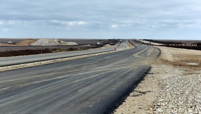 Движение на автоподходах к мосту откроют, не дожидаясь укладки последнего слоя асфальта